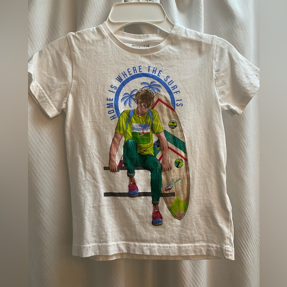 Boys size 6 never worn, bought at a 5 star resort in Mexico.